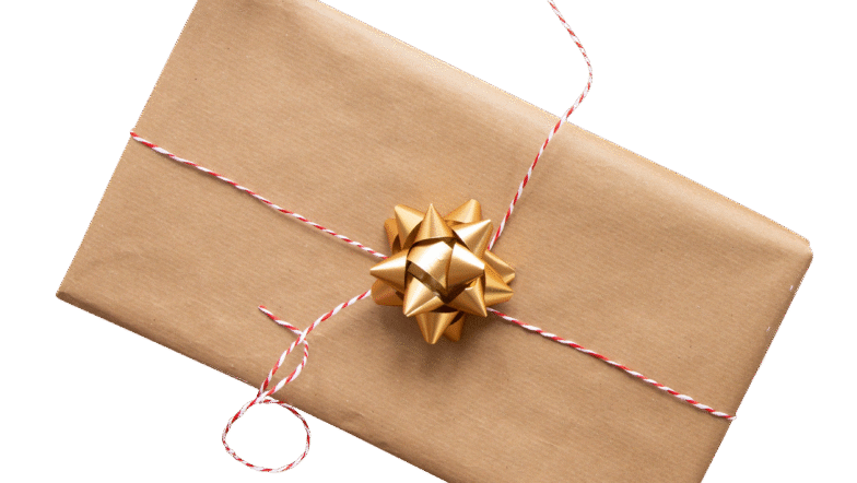 Kraft wrapped gift with a Gold Bow