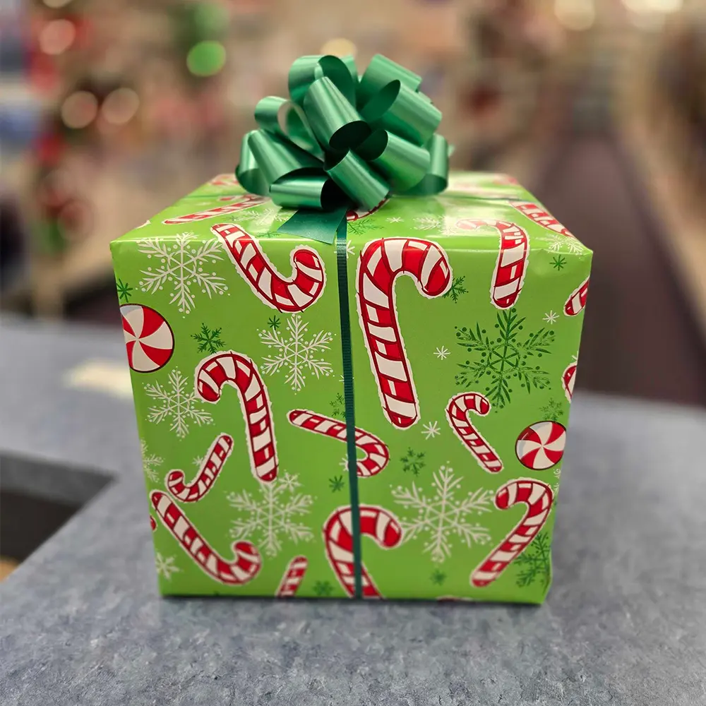 Gift wrapping with ribbon and bow