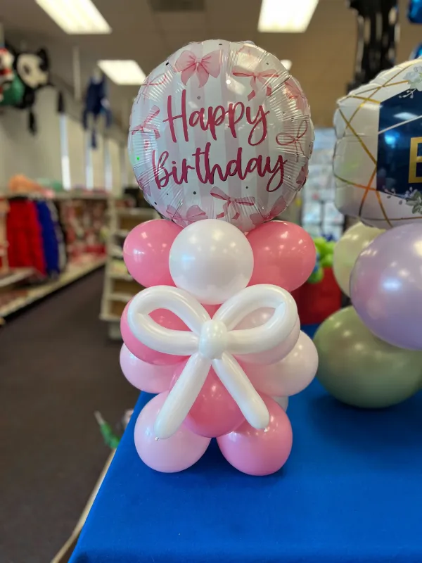 Happy birthday bow balloon centerpiece